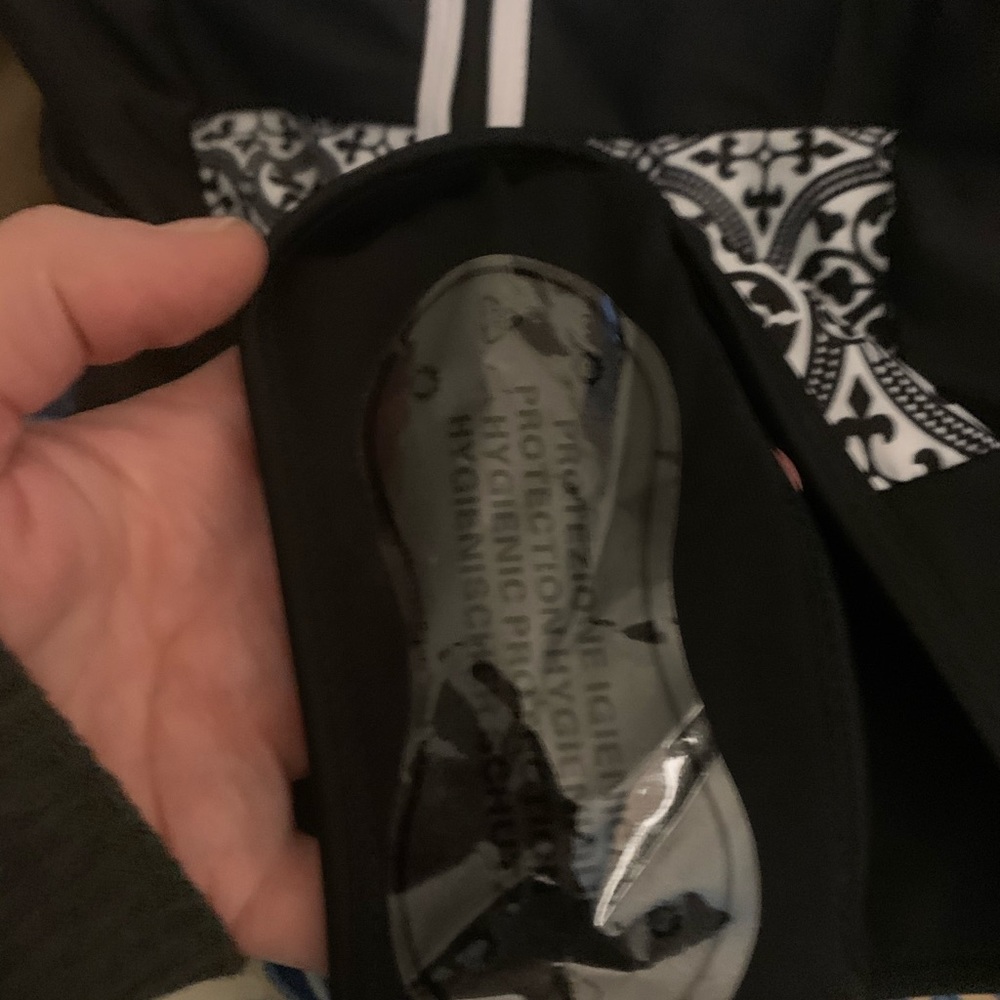 Beach Sissi Black one-piece rash guard swimsuit.